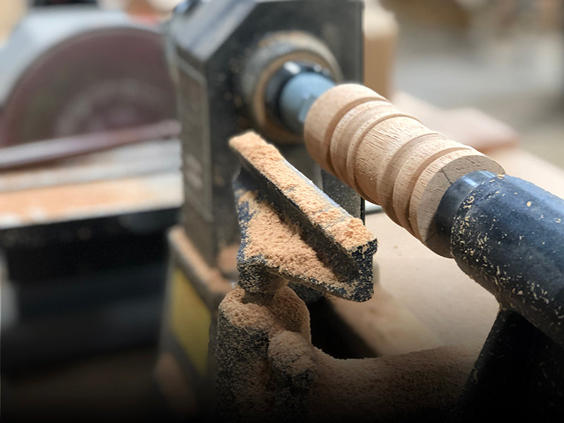Turning a gavel head from FSC-certified mahogany in our Virginia woodshop—part of a handcrafted award in progress