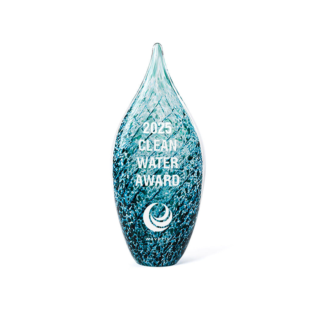 Tall teal and blue handblown glass award, looks like water, designed exclusively by Rivanna. Crafted in the USA and signed by the artist for authentic recognition.