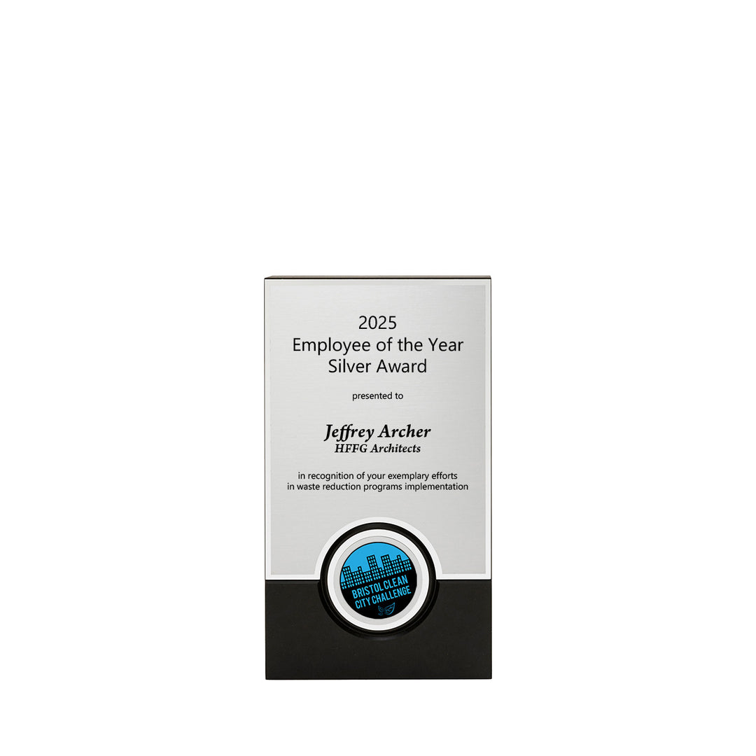 8-inch sustainable Medallion Award made from recycled materials in black and silver featuring a medallion or round  logo. Made in USA.