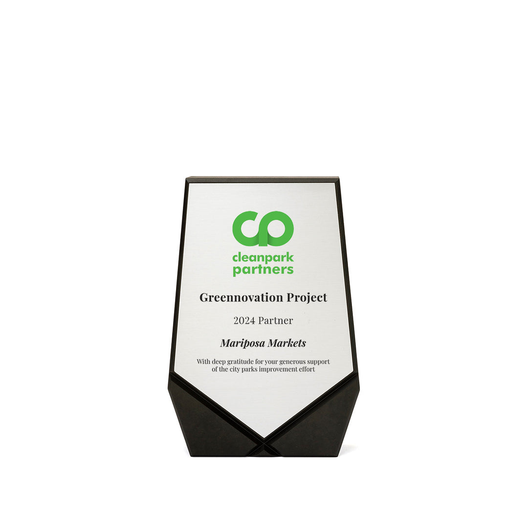 Keystone-shaped award in FSC Recycled Richlite with silver plate – eco-friendly partner recognition plaque