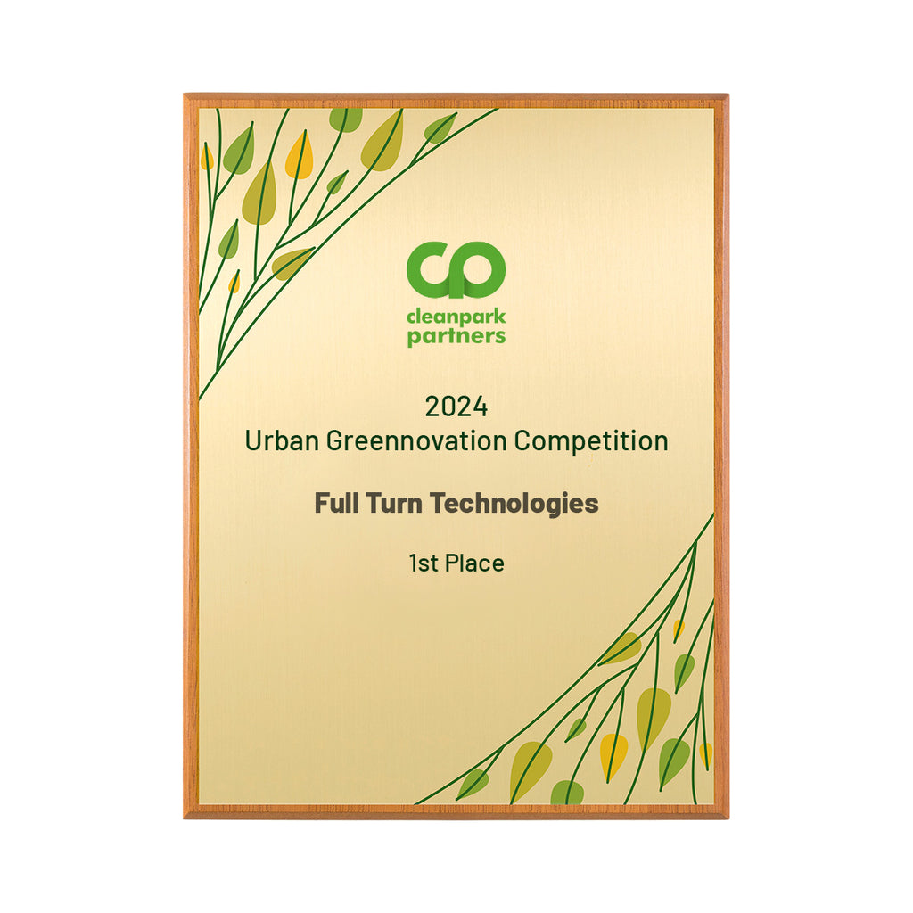 Gold award plaque with green and gold leaf motif representing autumn, mounted on FSC-certified wood