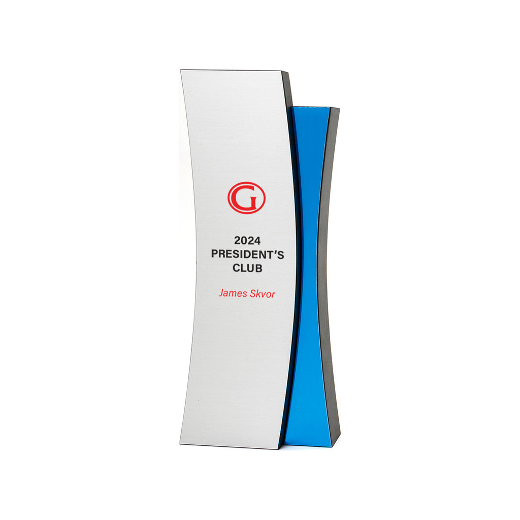 Modern curved eco award with silver face and blue accent.  FSC recycled base – unique, high-end recognition design. Made in USA.