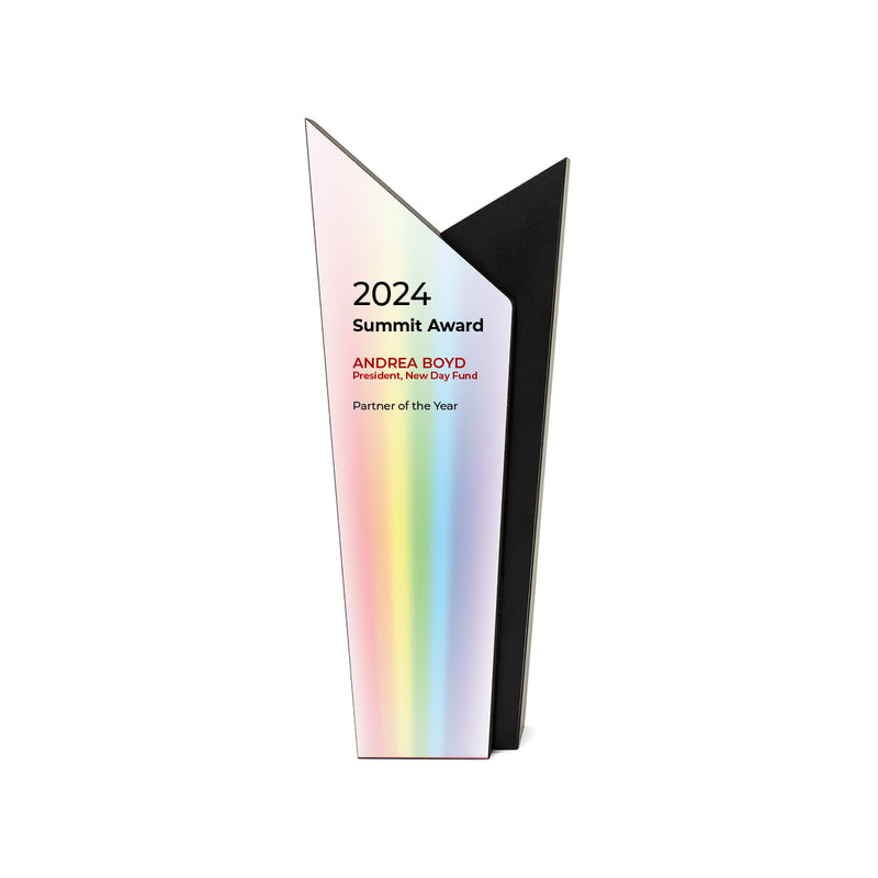 Tall black recycled award with a rainbow background on a white plate.