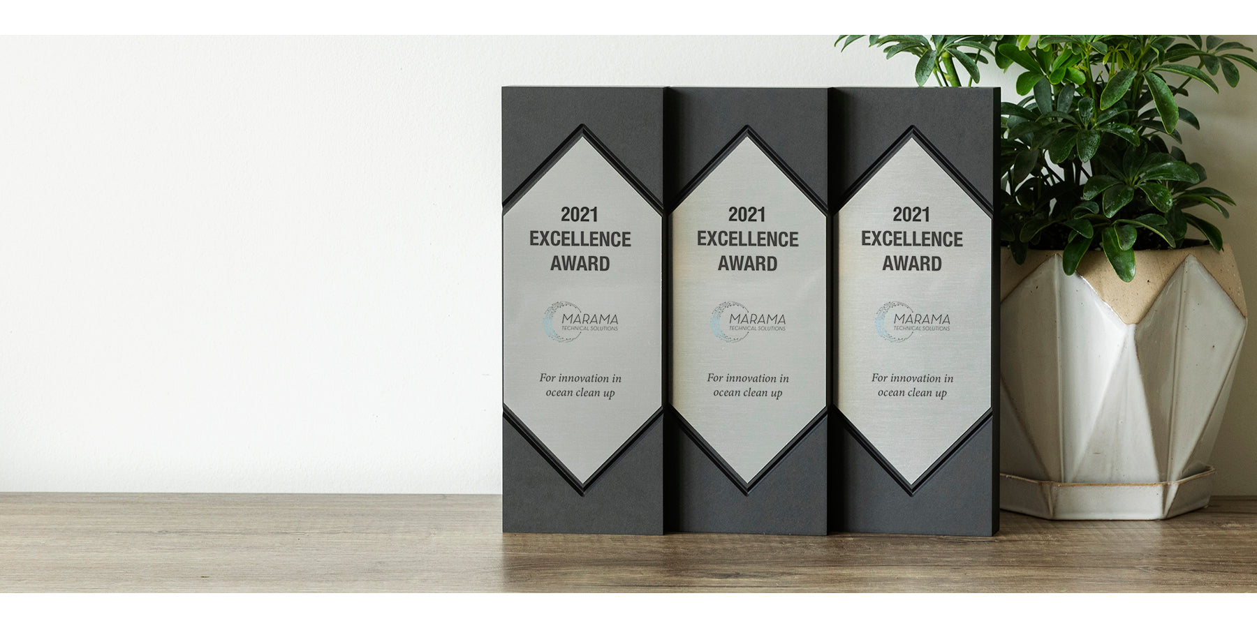 Set of duplicate eco-friendly awards made from recycled Richlite and brushed aluminum—ideal for recognizing teams, partners, or multiple recipients of the same honor.