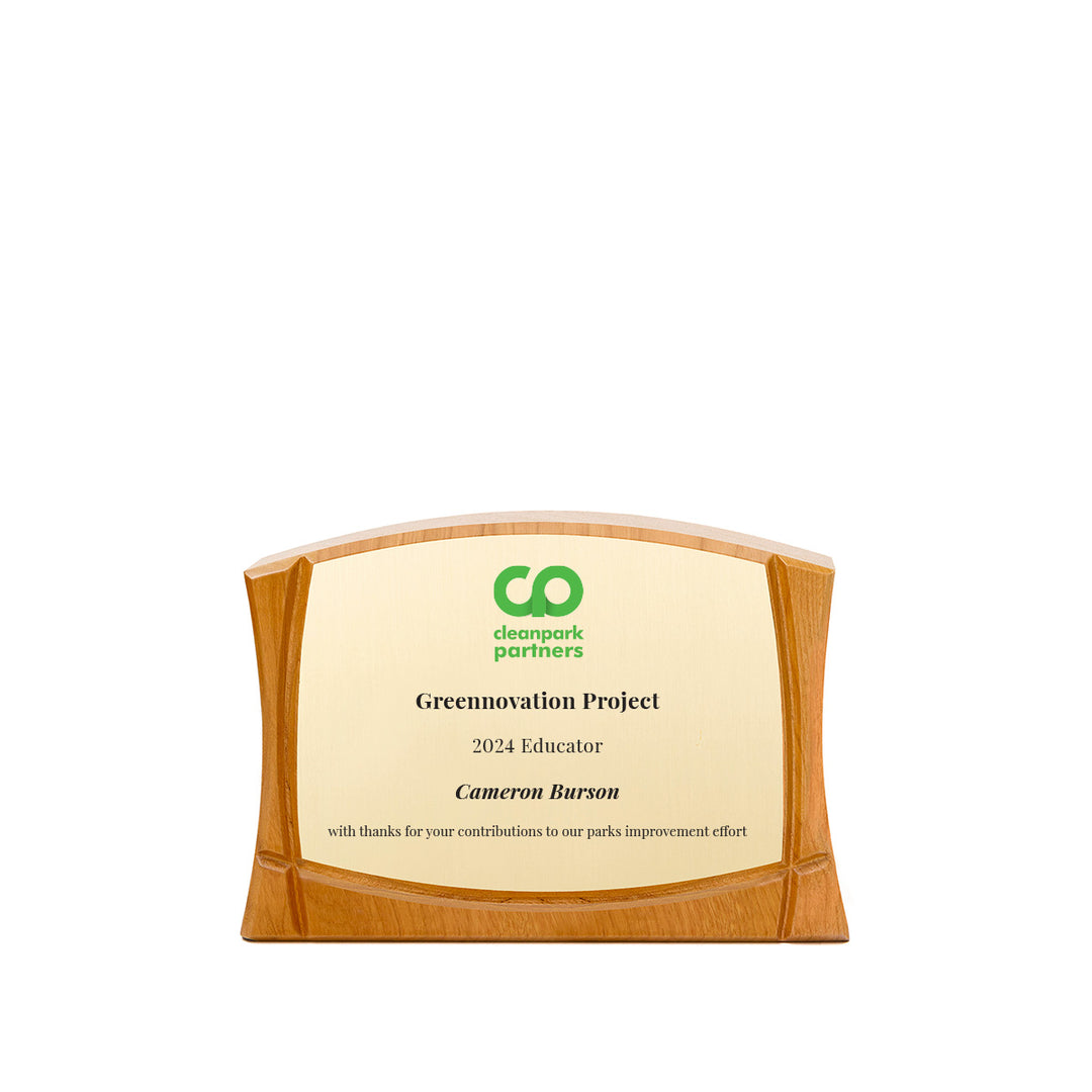 Sculpted cherry wood Bay award FSC-certified plaque with contoured gold metal plate | original design by Rivanna.