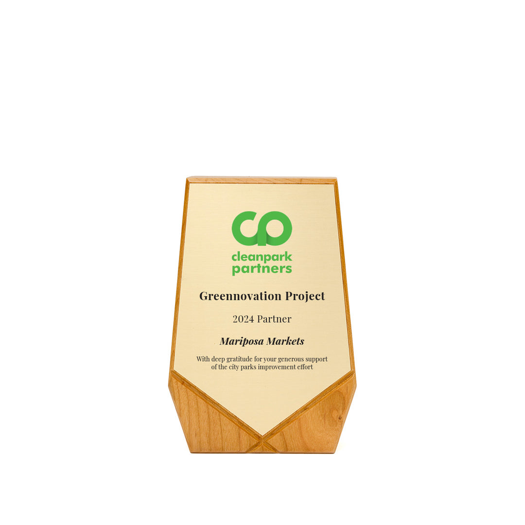 Eco-friendly Keystone award in cherry hardwood with pentagon shape and brushed gold plate | crafted by Rivanna.