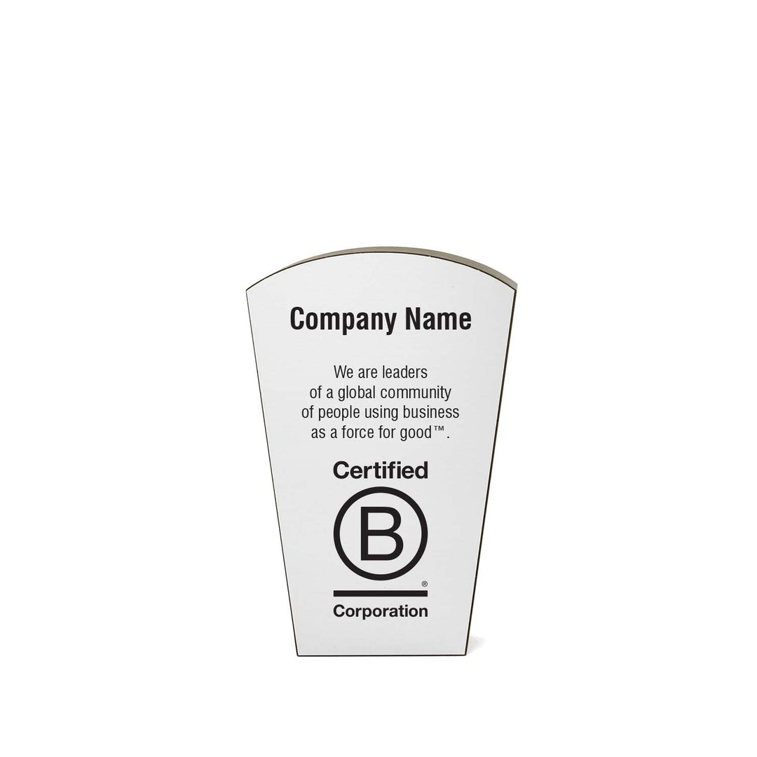 Customizable recycled  B Corp award in silver and black with company name, B Corporation logo, and engraved mission text.